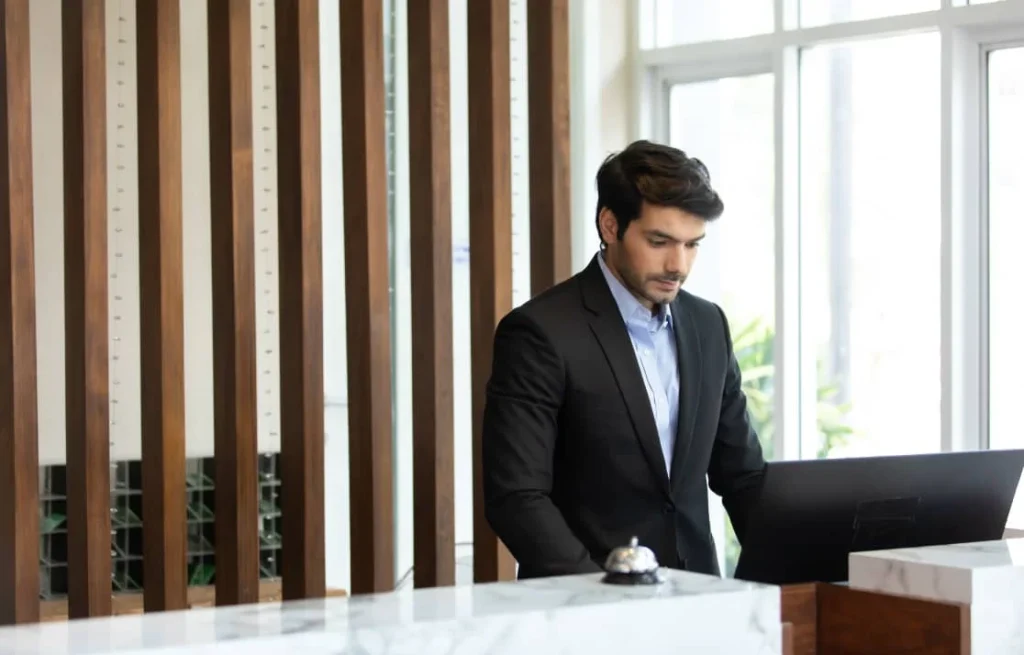 employee behind the front desk