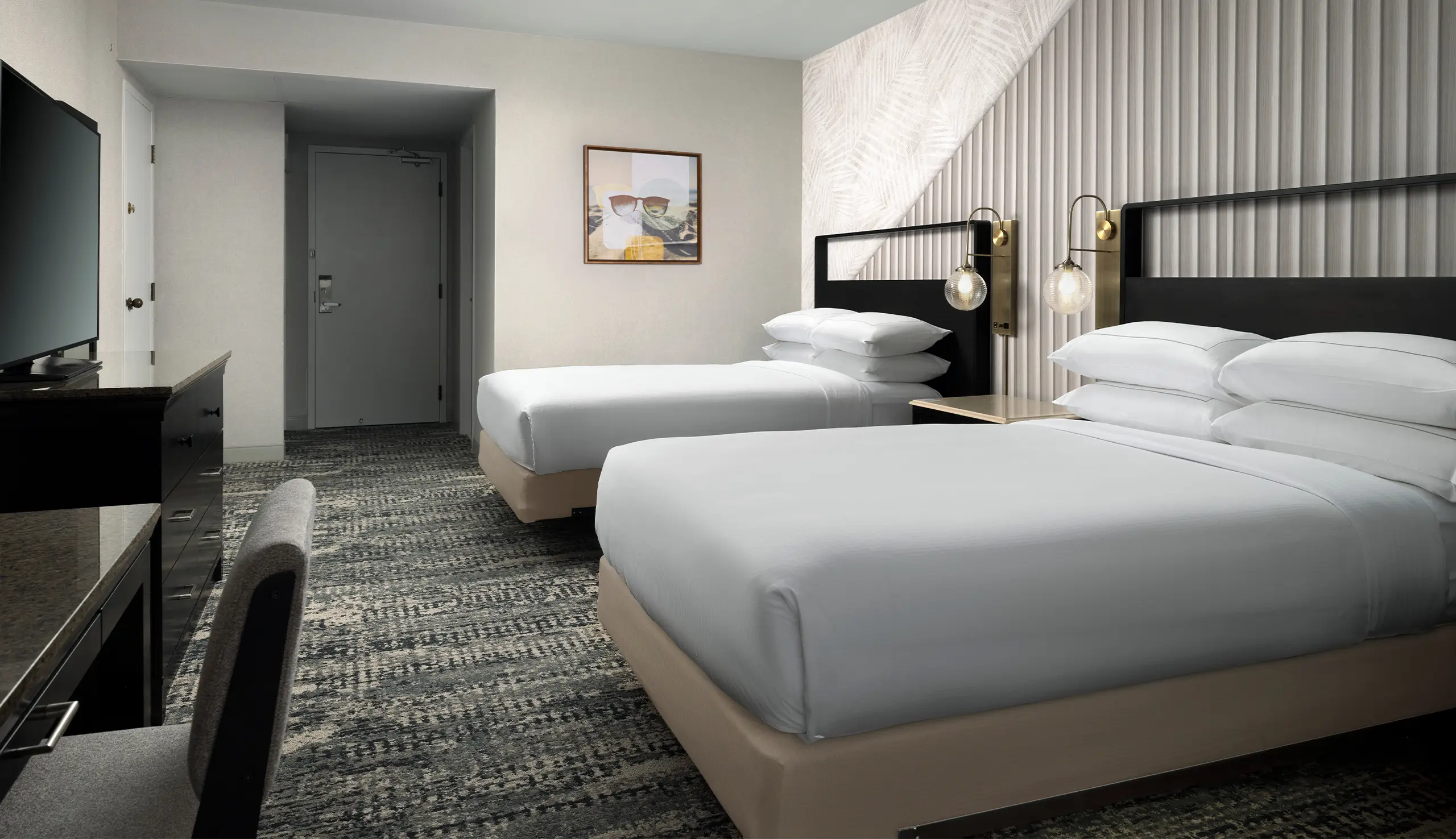 view of double beds in hotel room in orange, ca